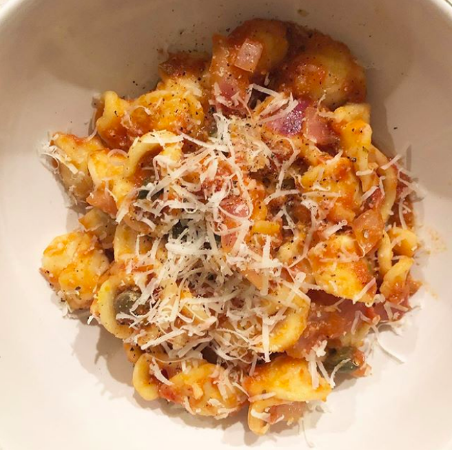 Orecchiette pasta with tomato sauce with tuna and capers